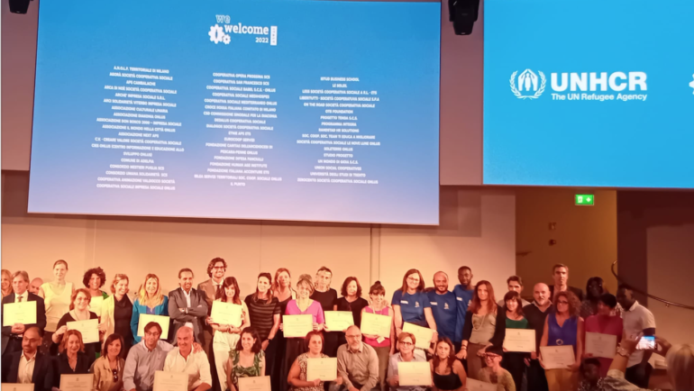 Logo WeWelcome, UNHCR premia la Medihospes per il terzo anno consecutivo